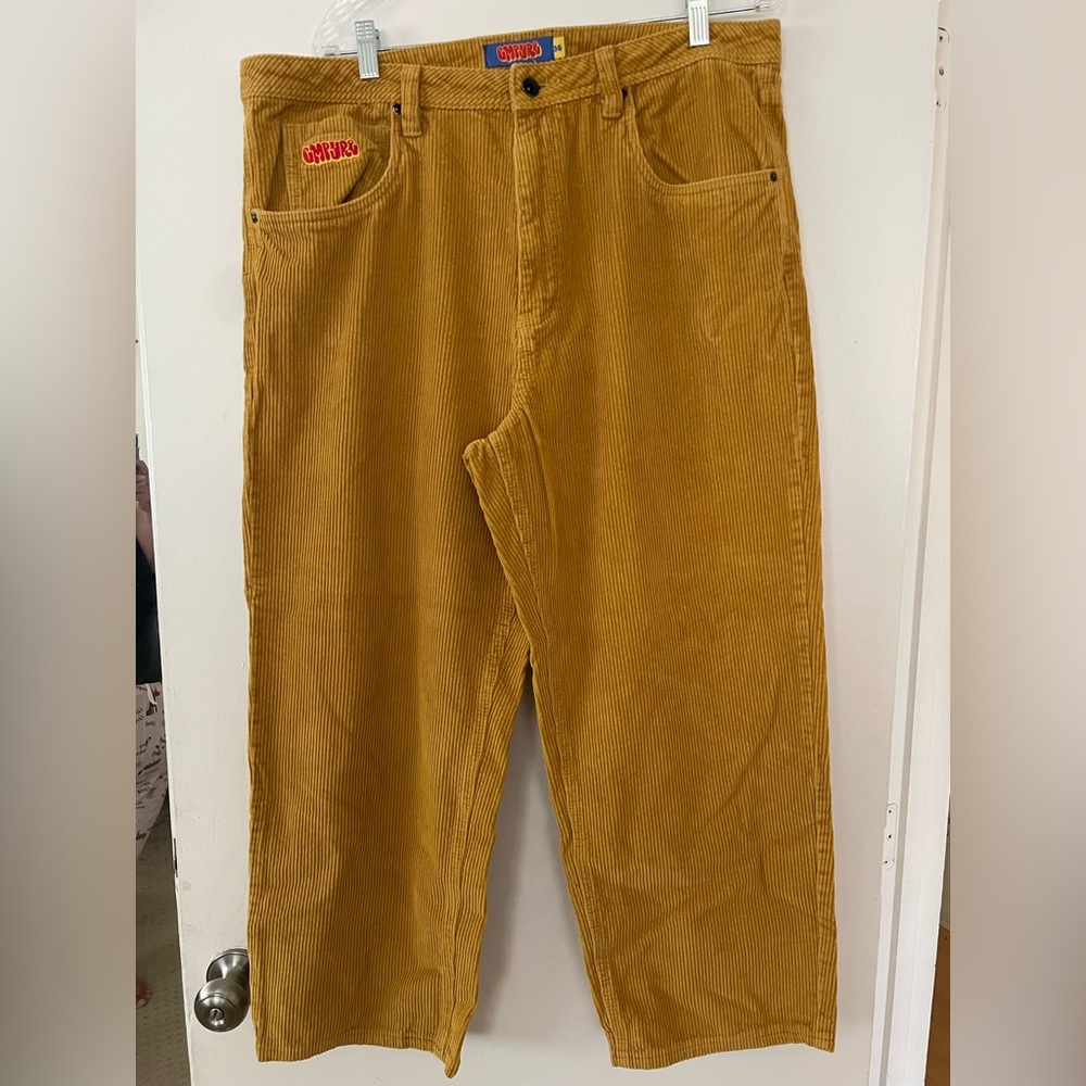 Empyre corduroy pants. 36x28 in mustard color